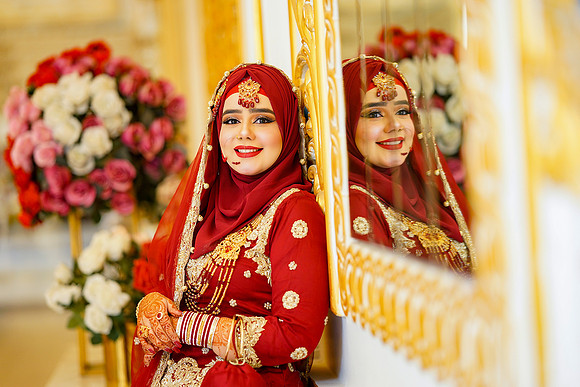 Girl's reflection at wedding