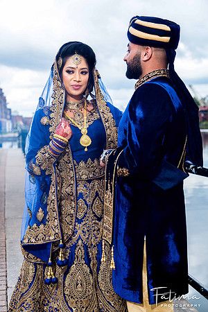 Bride & Groom in blue wedding dress
