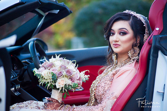 bride in a convertible sports car