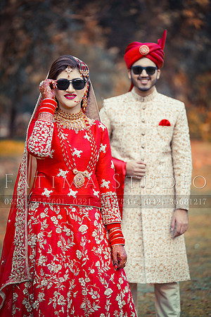 Groom & Bride wearing sunglasses