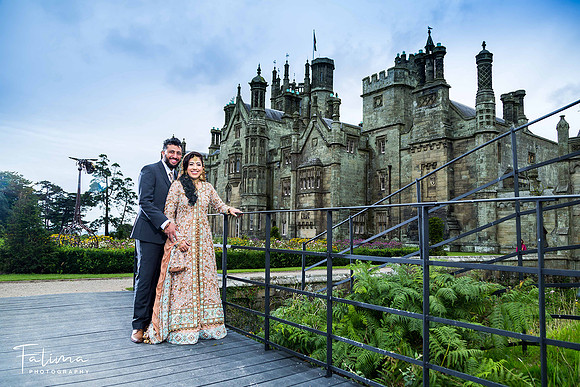 pakistani couple having a photoshoot by the castle
